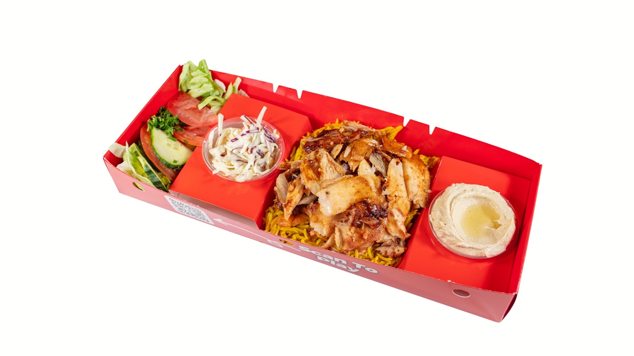 Chicken shawarma plate with rice, salad, coleslaw and hummus